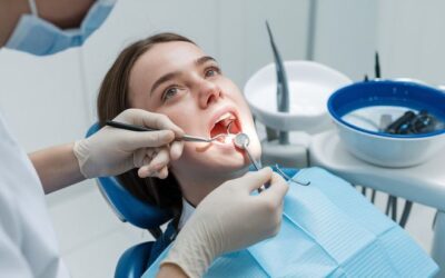 Dentist performing surgical wisdom tooth removal