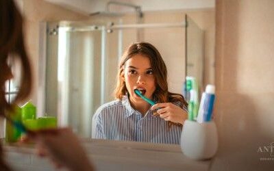Person worried about bad breath even after brushing teeth